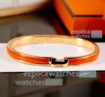 Replica Hermes Clic HH Orange & Gold Bracelet Extra-narrow Bangle